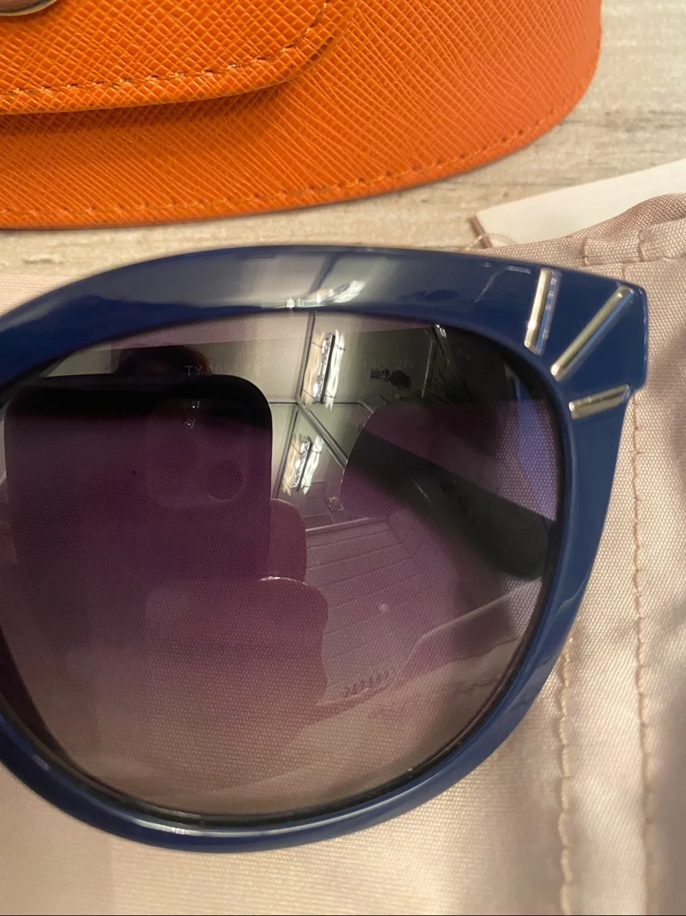 Tory Burch Navy sunglasses with cases.
